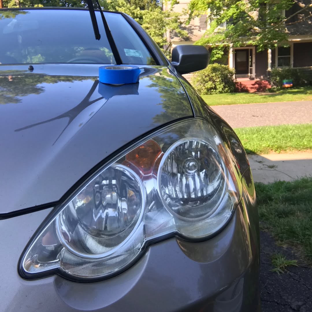 The same headlight after sanding, polishing and sealing — fully clear
